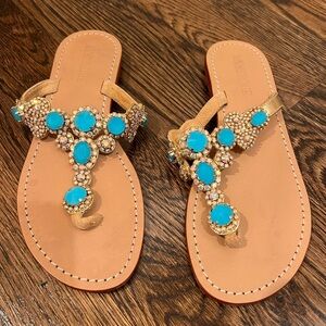 Mystique thong sandals.